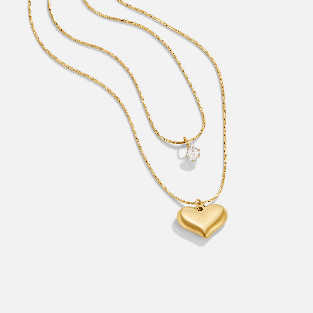 Amari Layered Heart Pendant Necklace, two gold chain necklaces layered, with a heart and a