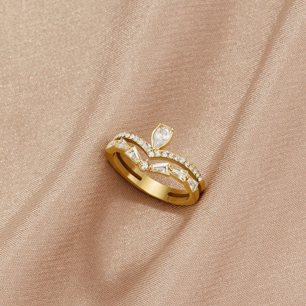 18K Gold Lilly Crystal Ring, gold ring with pear and triangle stones on draped satin