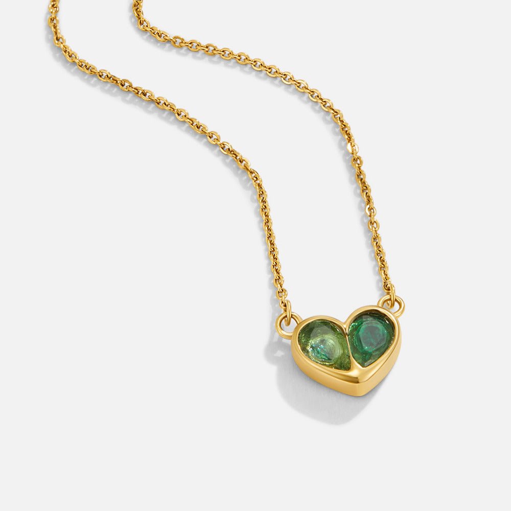 Amore Crystal Heart Necklace, gold chain necklace with a heart pendant of two green stones