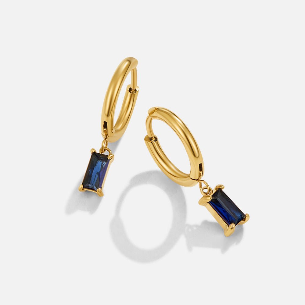 Avery Blue Crystal Drop Earrings, pair of gold hoop earrings with rectangular blue stone drops