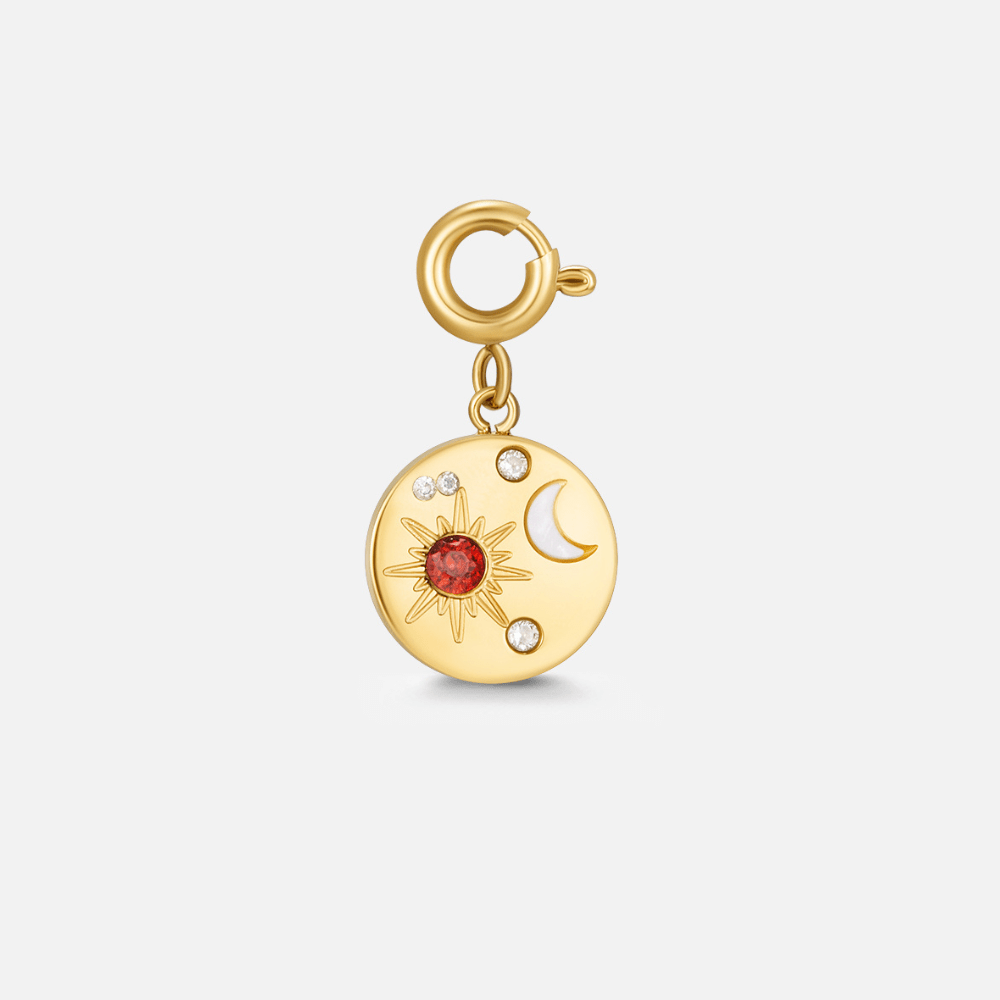 Celestial Sun & Moon Charm, gold charm with a red stone sun, white moon and small crystals