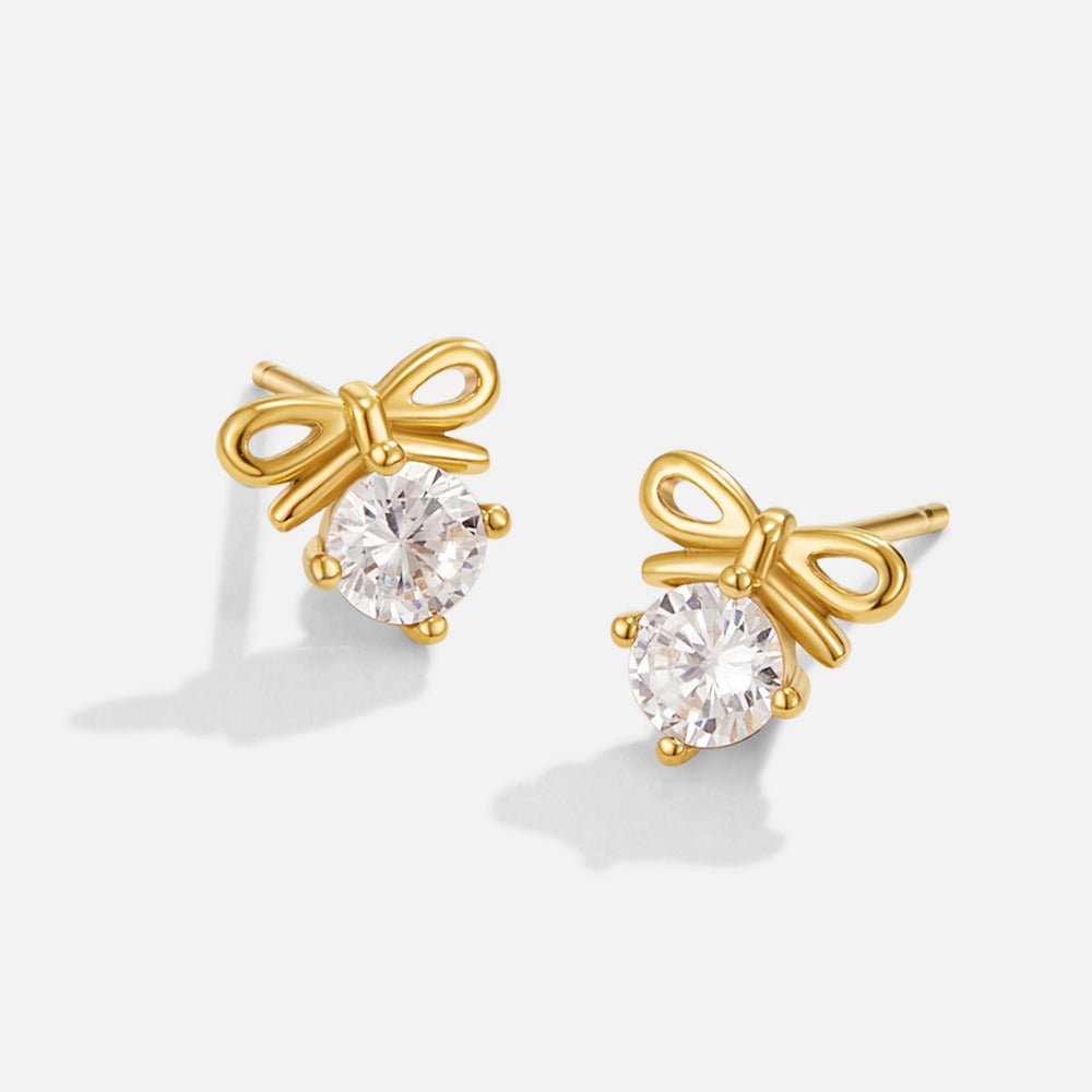 Crystal Bow Stud Earrings, pair of gold bow studs with round clear crystals on white