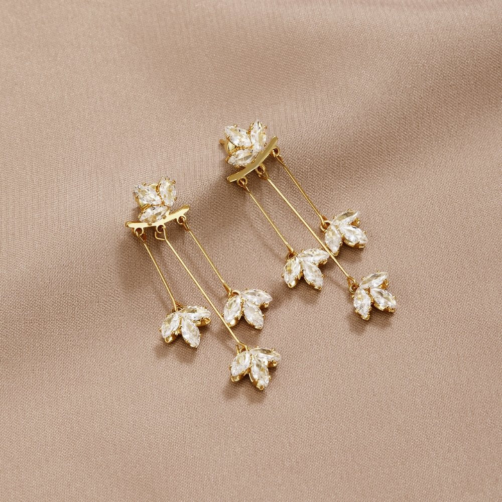 Crystal Lotus Waterfall Earrings, pair of gold drop earrings with marquise crystal clusters on