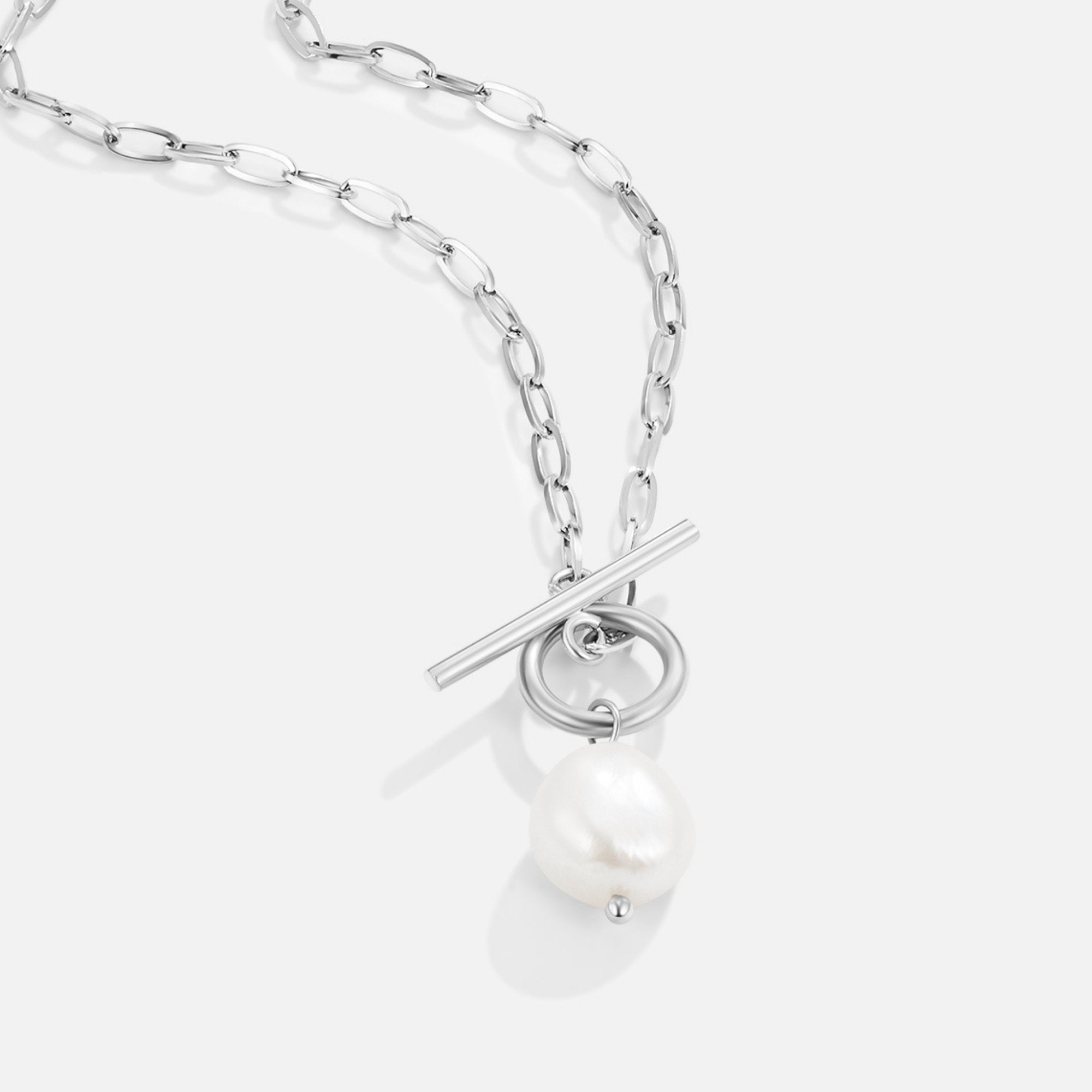 Eva Freshwater Pearl Silver Necklace, flat lay close-up of silver chain with toggle clasp and