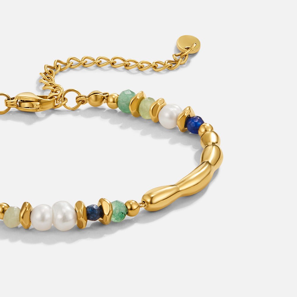 Freshwater Pearl & Malachite Beaded Bracelet, flat-lay close-up of gold bracelet with pearls