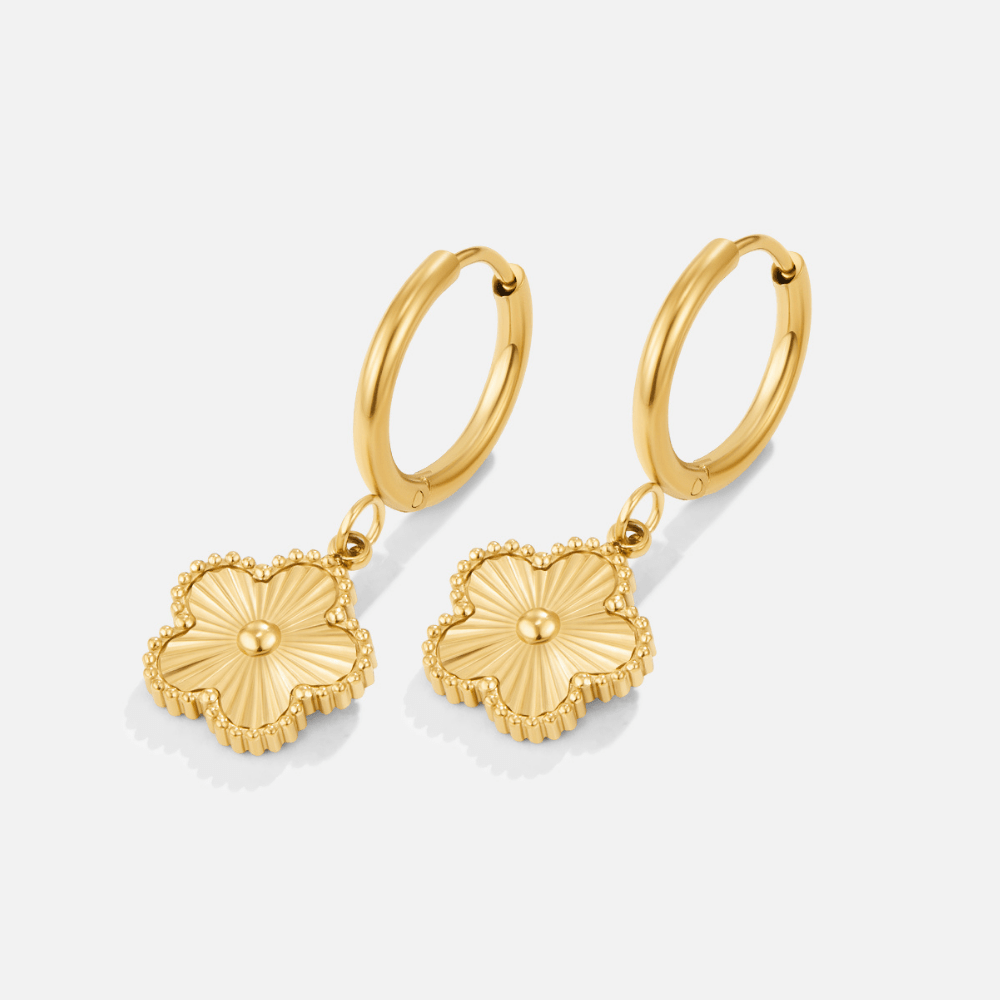 Golden Clover Hoop Earrings, pair of gold hoop earrings with clover charms, on white background