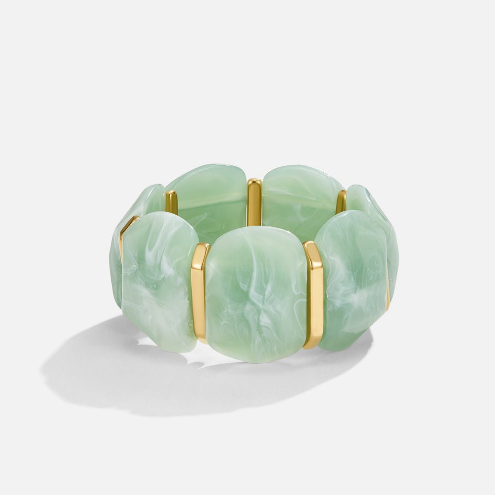 Green Aventurine Elastic Bracelet, stretch bracelet lying flat, mint-green marbled panels with