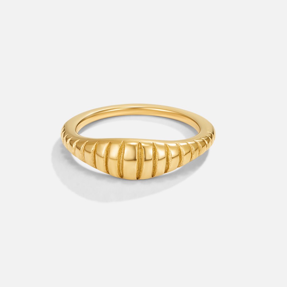 Kaila Mini Croissant Ring, gold ring with ridged, domed top on a plain background