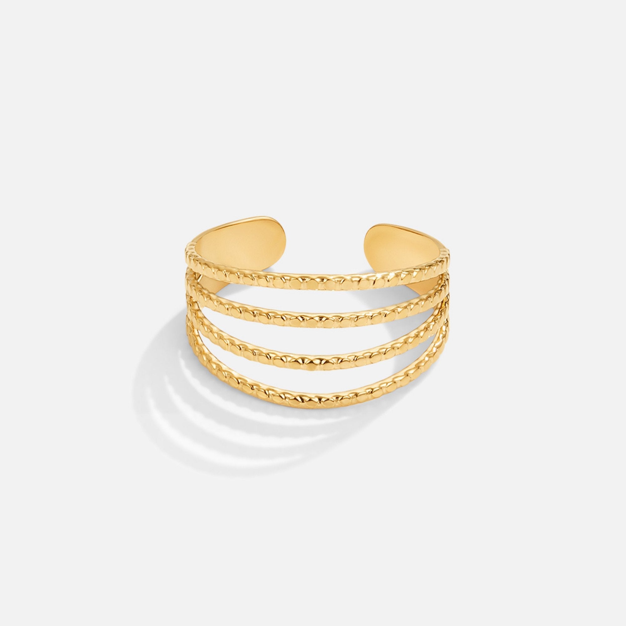 Madison 18K Layered Ring, open gold ring with four textured bands, on white background