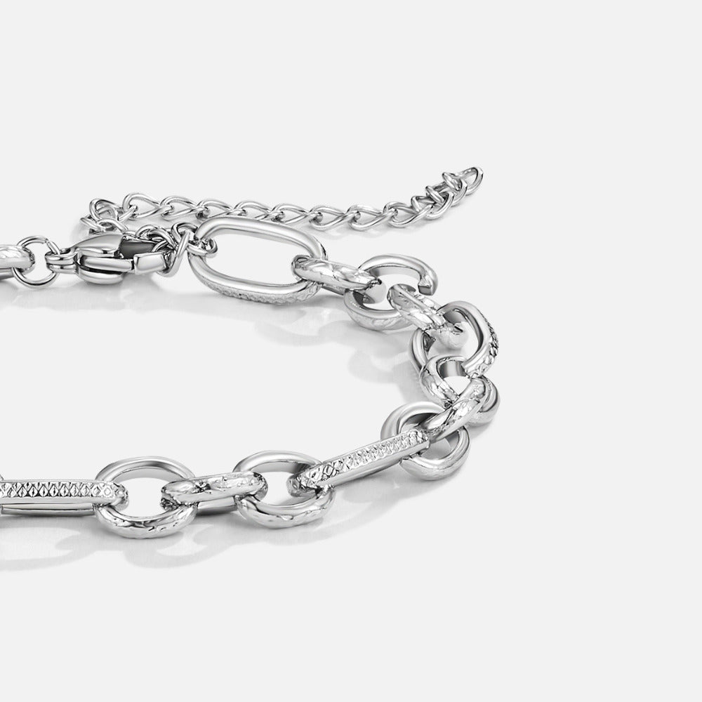 Miriam Chunky Silver Bracelet, close-up of a silver chain bracelet with textured links and extender