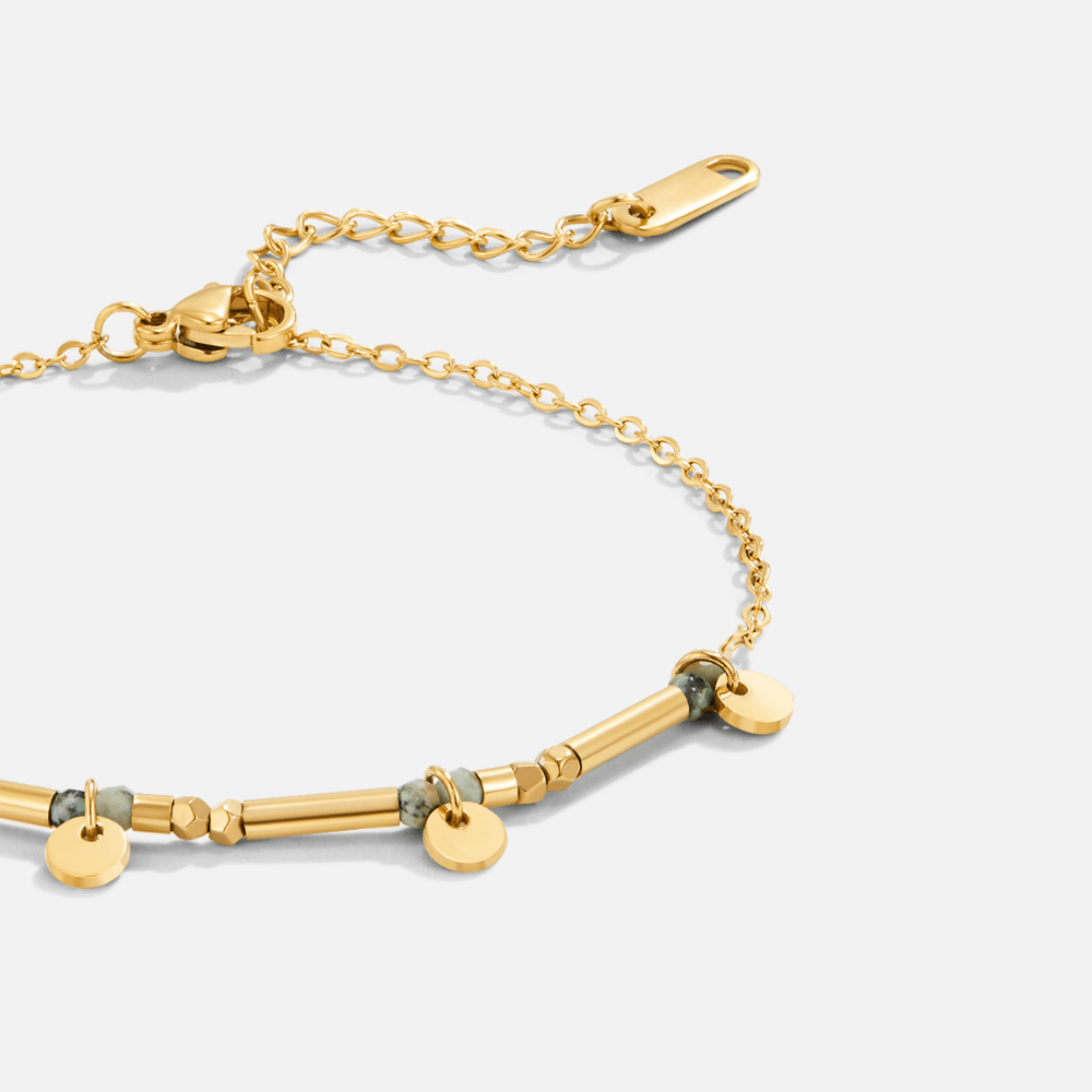 Neri Gold Disc Bracelet, close-up of gold bracelet with tube beads, grey stones and disc