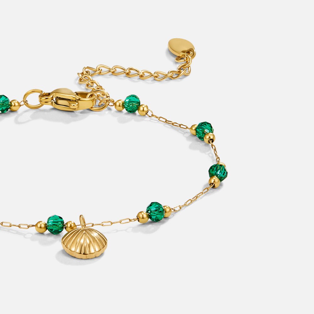 Nerissa Gold Shell & Green Bead Bracelet, flat close-up of gold bracelet with green beads and