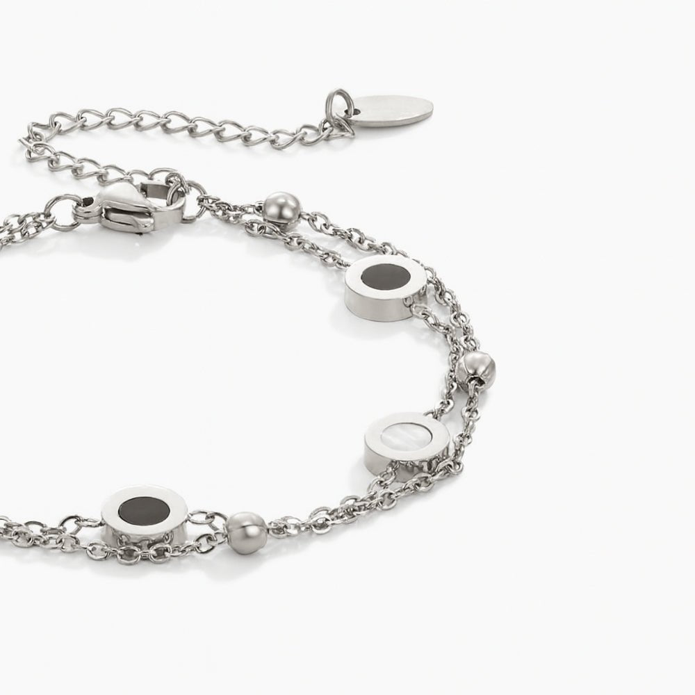 Onyx & White Stone Silver Bracelet, close-up of a silver double-chain bracelet with round
