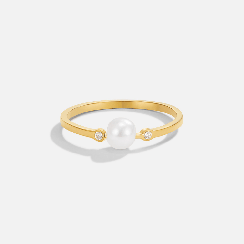 Peri Pearl Ring, standalone on white, gold band with a pearl and two small stones