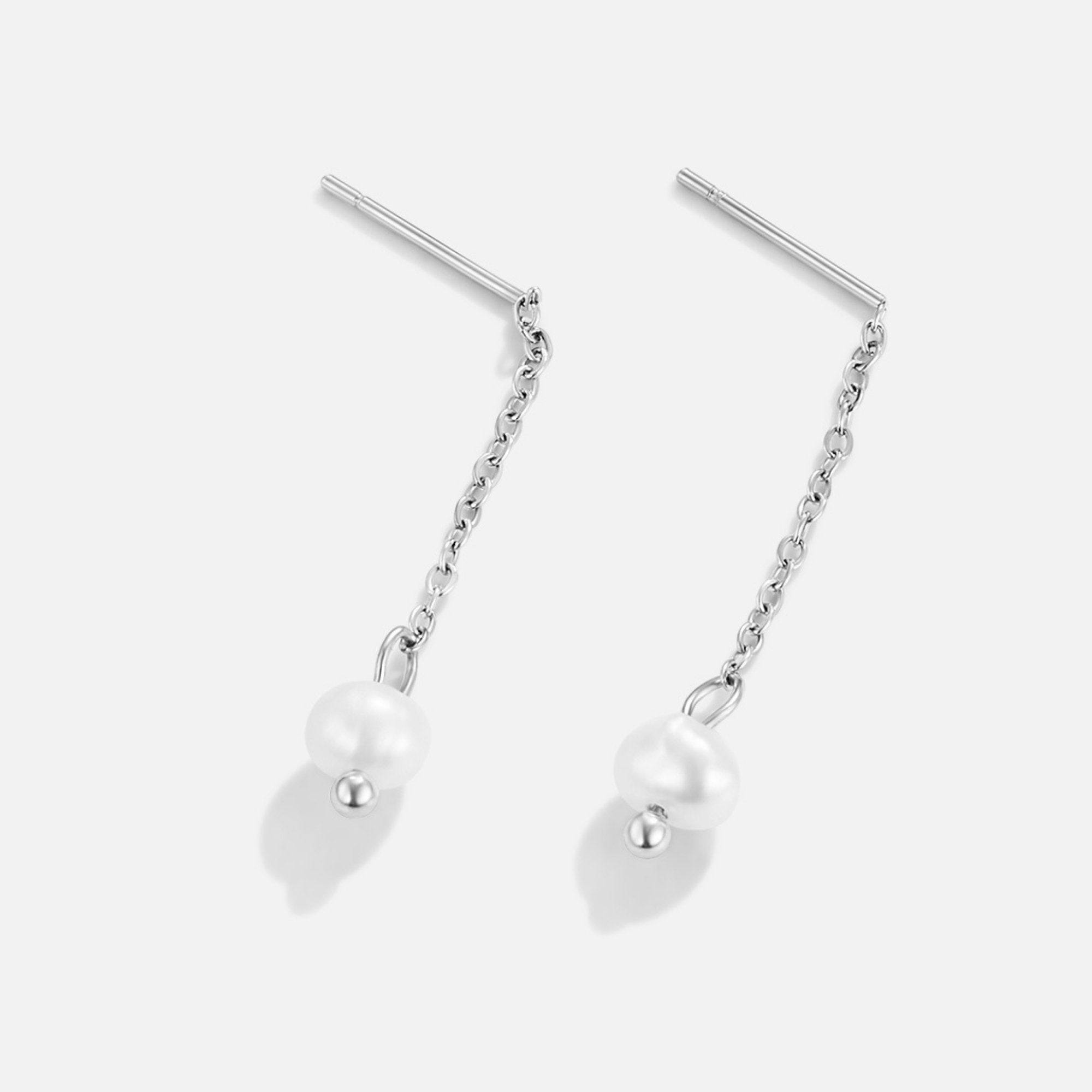 Silver Maria Pearl Drop Earrings, pair of silver stud drop earrings with pearls on white background