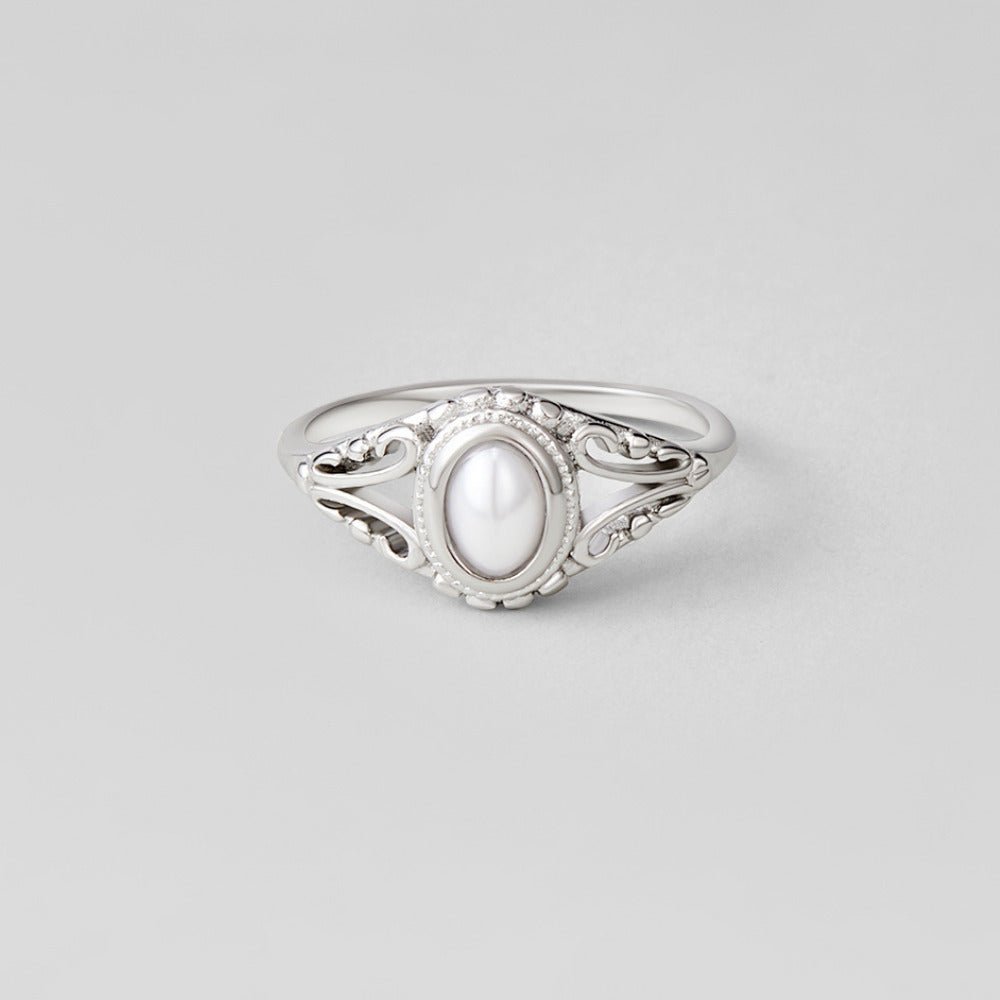 Silver Vintage Royal Pearl Ring, silver ring with oval white pearl centre on grey background