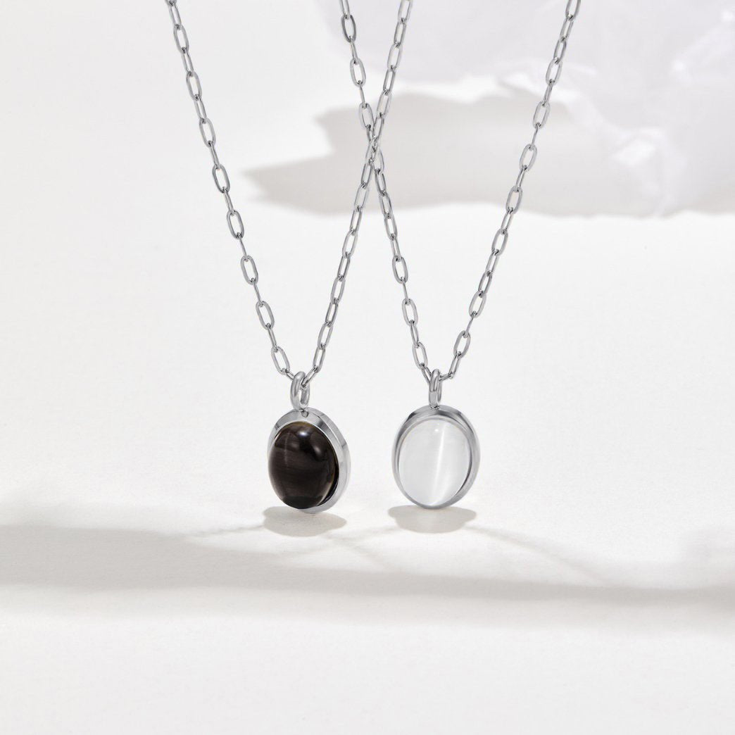 Silver White Opal Necklace, two silver chain necklaces with oval pendants, one dark and one pale