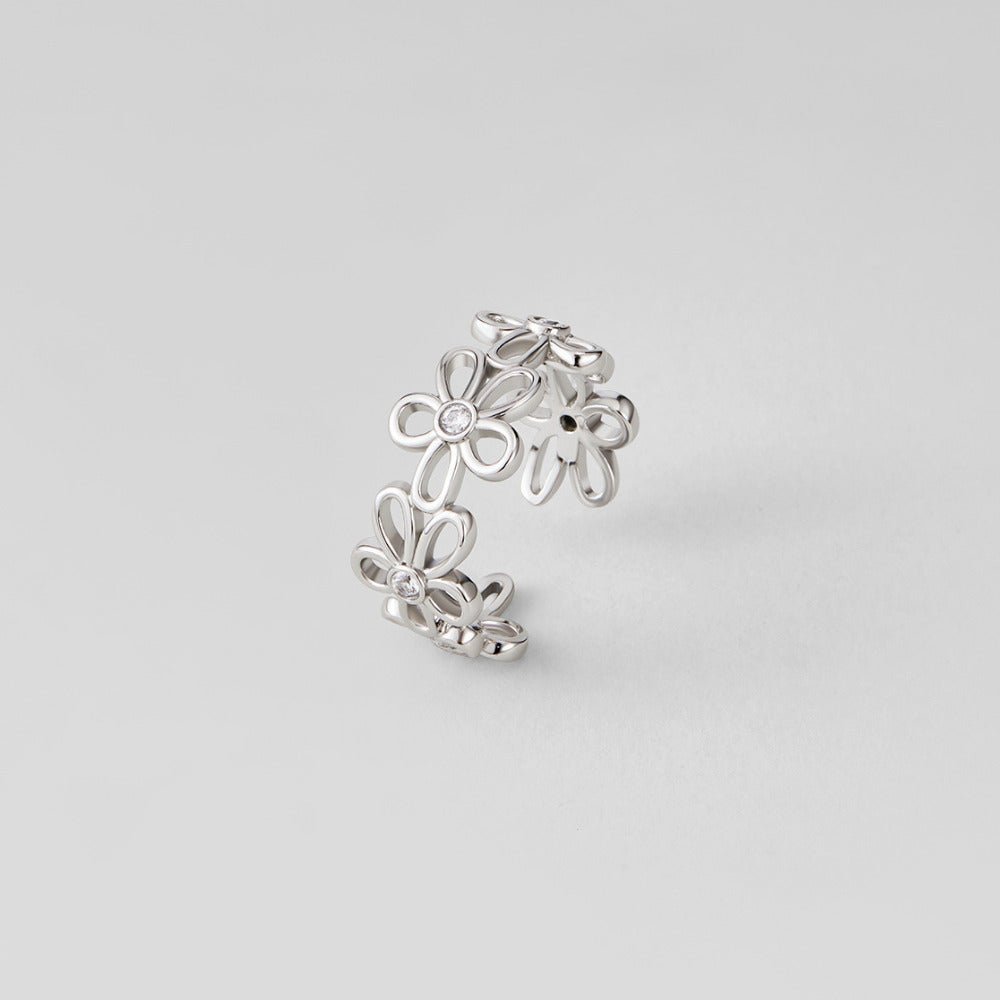 Silver Wildflower Infinity Ring, open-cuff ring of outlined flowers with clear centre stones