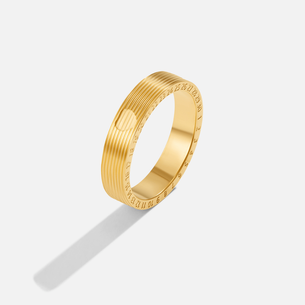 Soleil Gold Band Ring, gold band with ridged outer surface and numerals on the edge