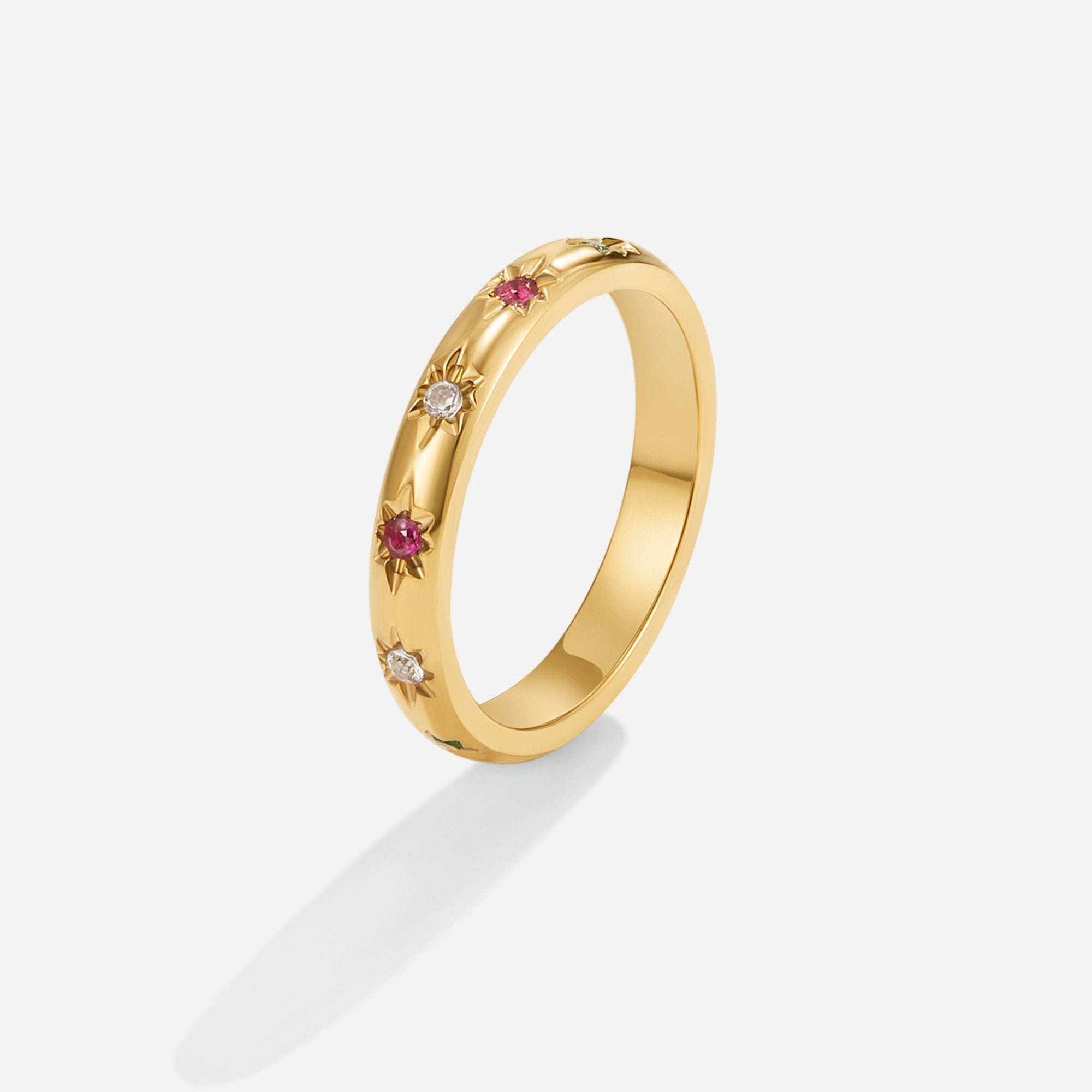 Tali Rainbow Crystal Ring, standing upright on a plain light background, gold band with red