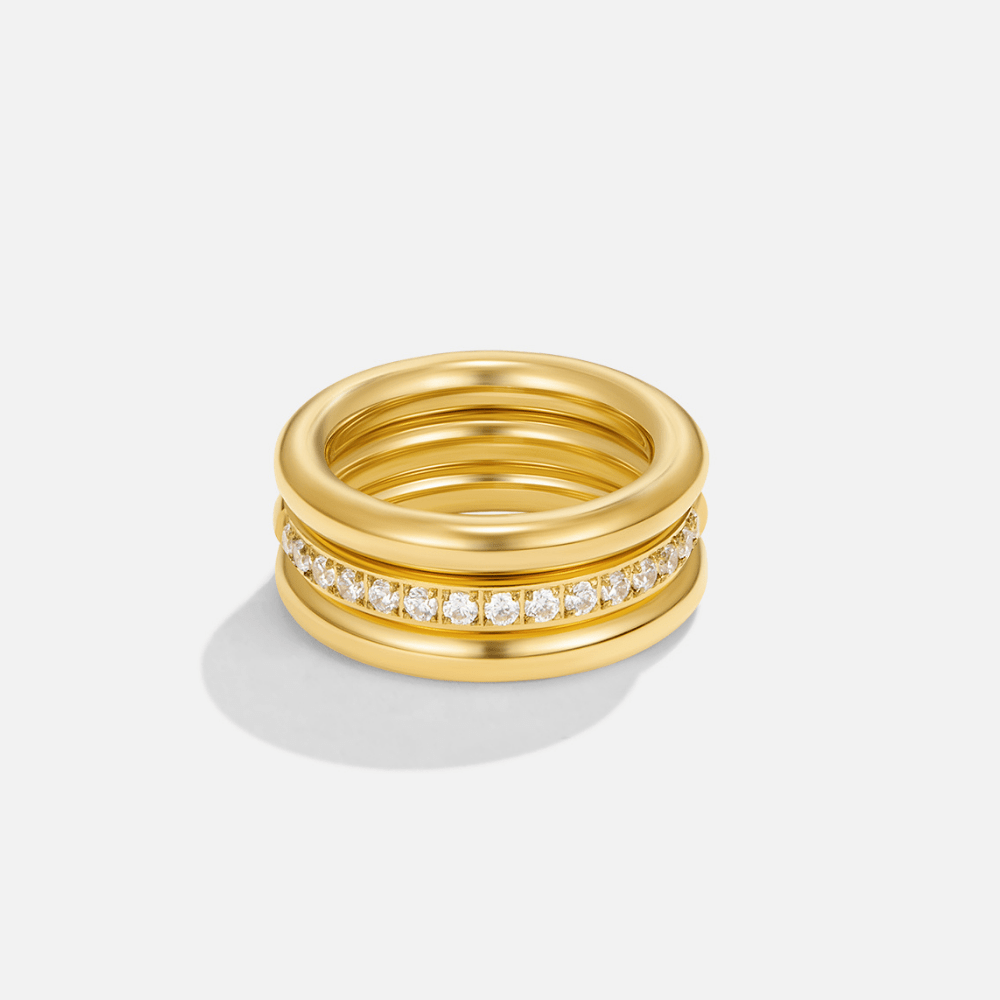 Vana Trio Gold & Crystal Ring Set, stacked gold rings with a row of clear stones, on white