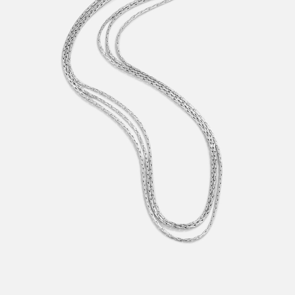 Vina Silver Multi Layered Chain Necklace, three silver chains draped in a flowing curve on
