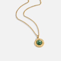 Green Aventurine Coin Necklace, gold chain necklace laid flat with a round green stone pendant