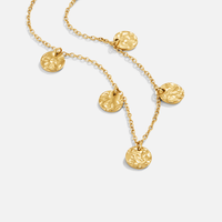 Elodie Hammered Coin Necklace, laid flat on white, five hammered gold coin pendants on chain