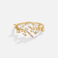 18K Gold Crystal Vine Ring, gold ring with crystal leaves on a vine, on a plain white background