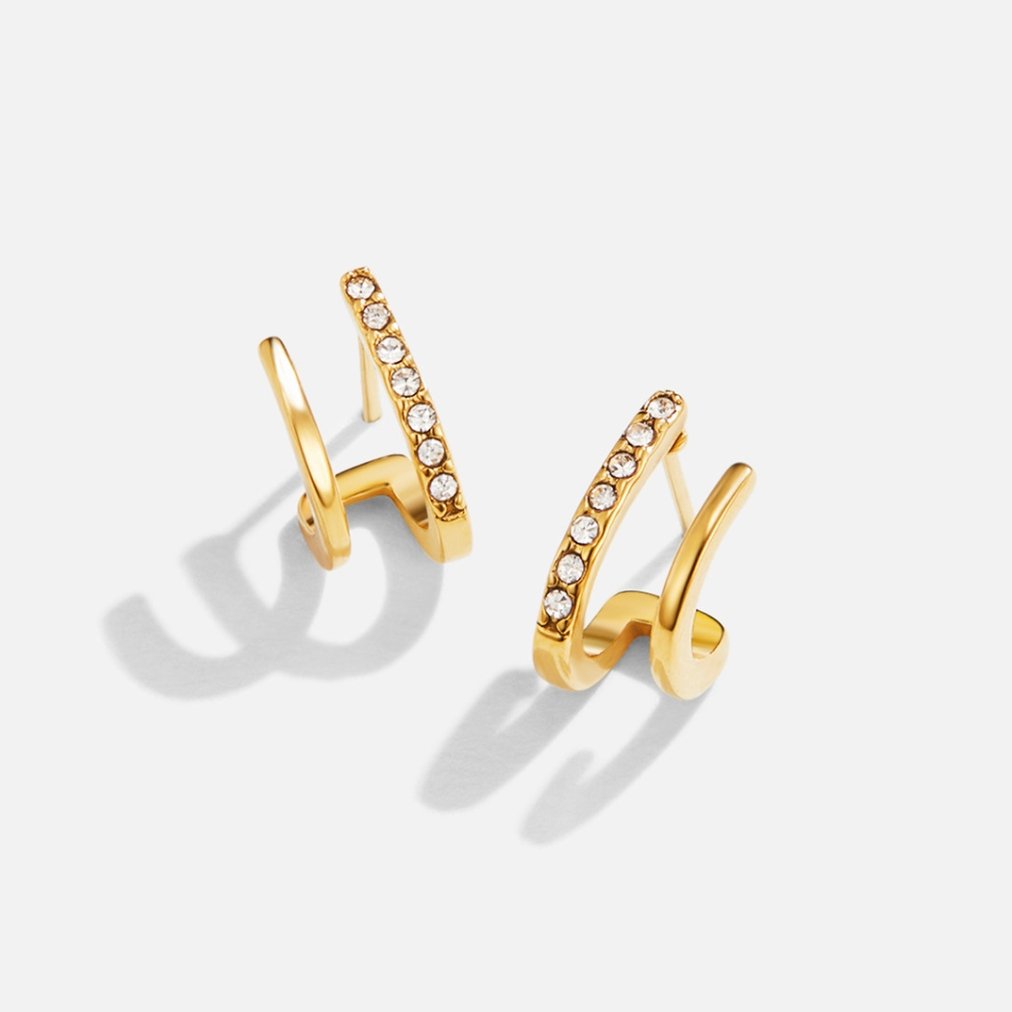 18K Gold & Crystal Claw Earrings, pair of gold earrings on a plain white background, one with