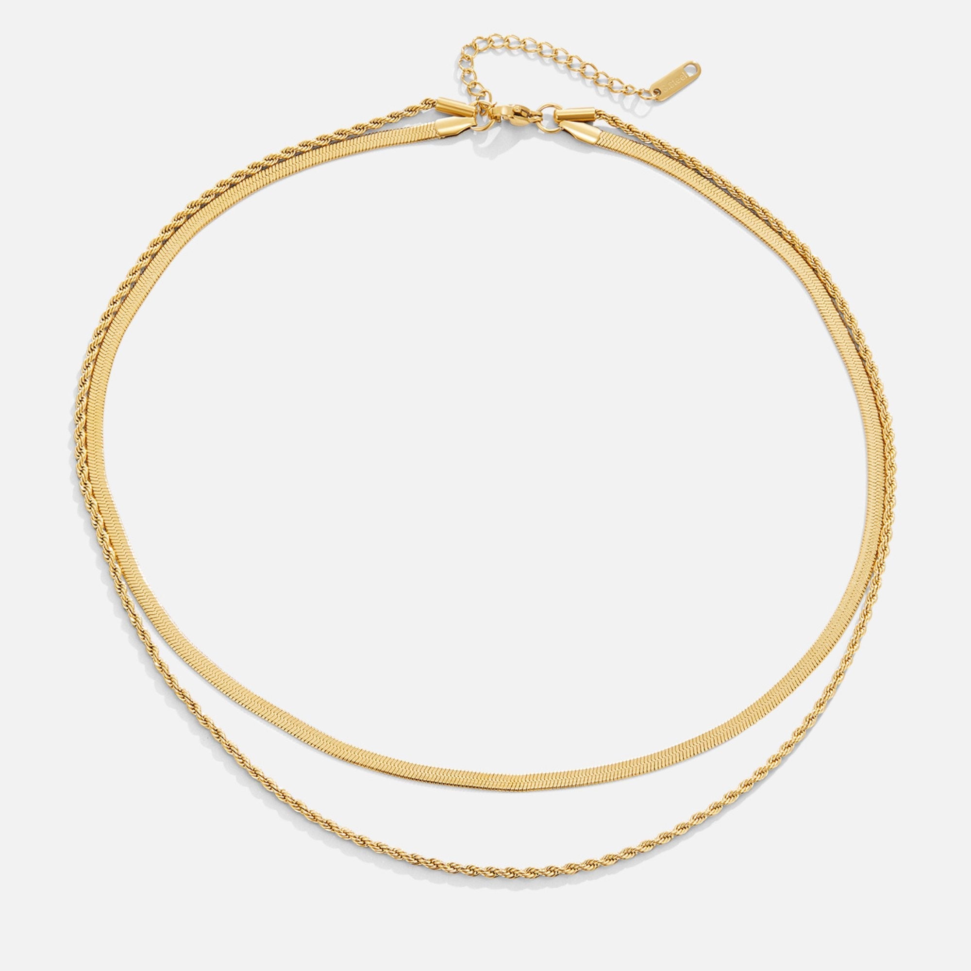 Alexandra Layered Necklace, flat lay of two gold chains layered, with extender tab