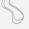 Alexandra Silver Layered Necklace, two silver chains laid out in a flowing curve on white