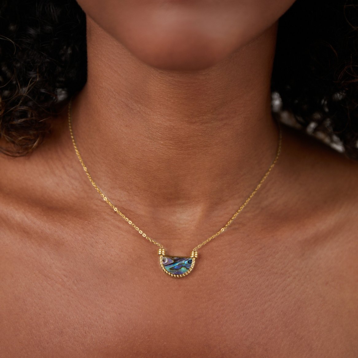 Amalfi Turquoise Shell Necklace, worn on a neck with a fine gold chain, half-moon shell pendant