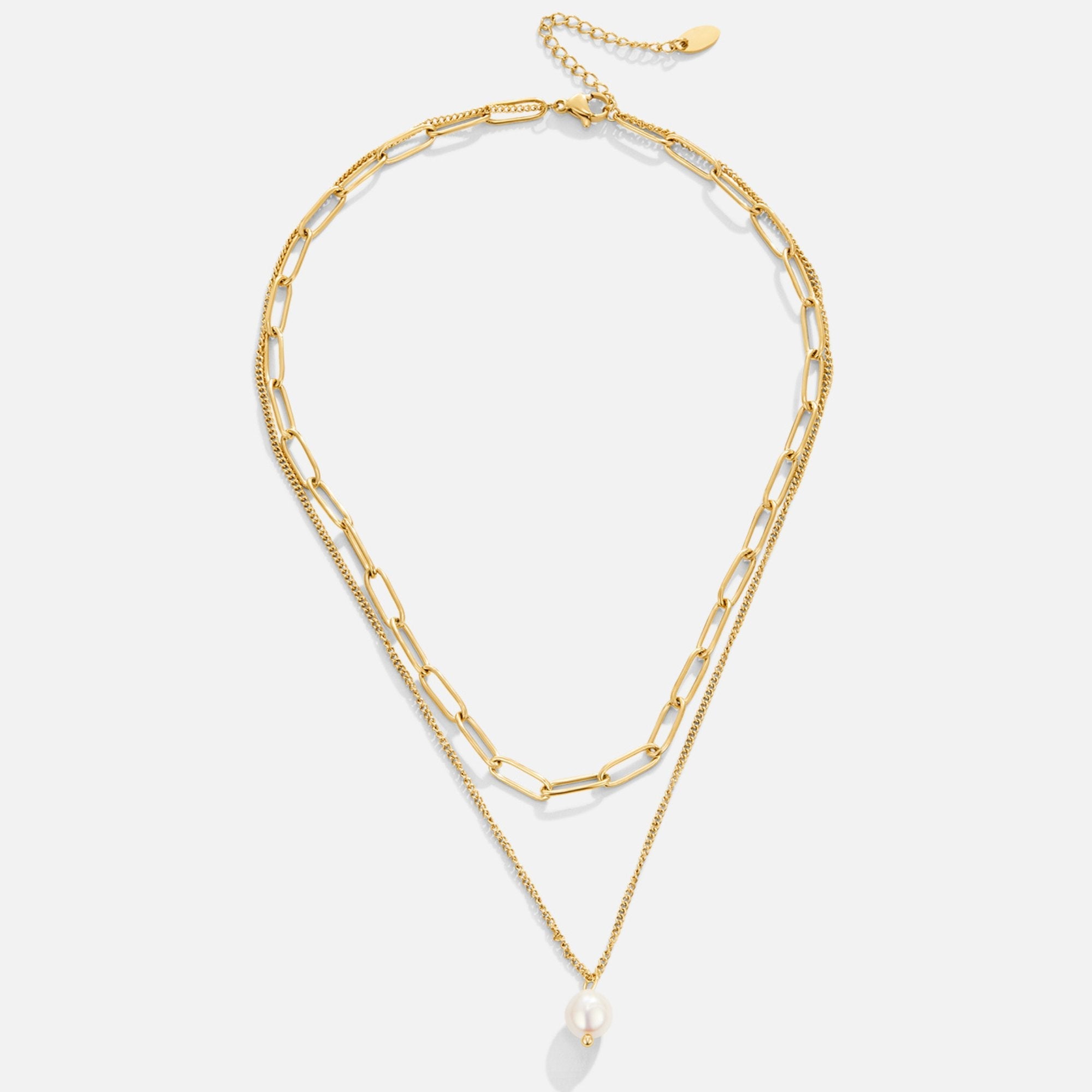 Angela Pearl Gold Necklace, flat lay of a layered gold necklace with a pearl drop