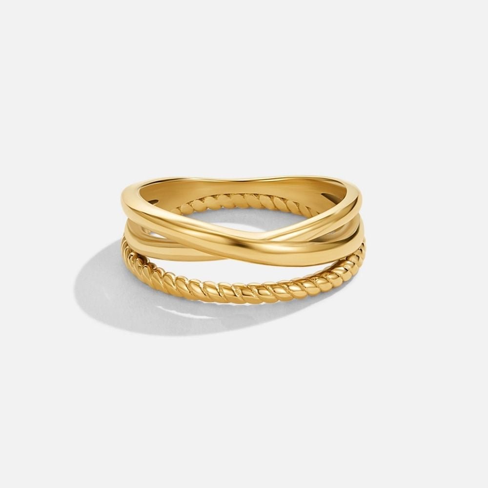 Ara Twisted Crossed Ring, gold ring with crossed smooth bands and a twisted rope band, on white
