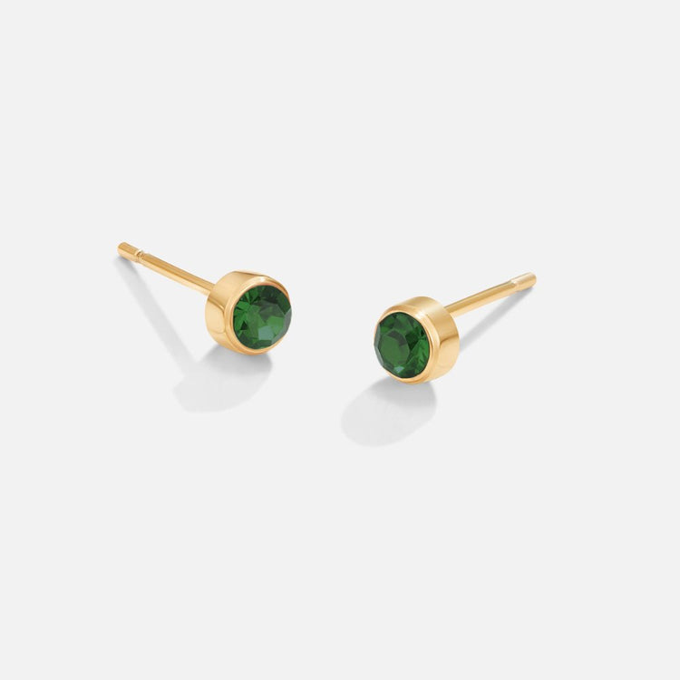 Birthstone Stud Earrings, pair of gold studs with green faceted stones on white