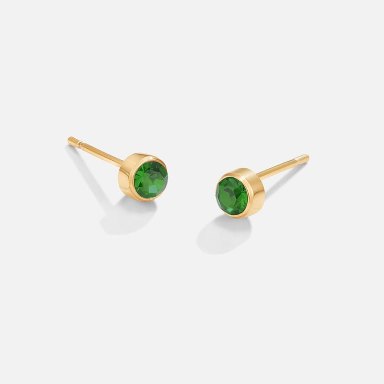Birthstone Stud Earrings, pair of gold stud earrings with round green gems on white background