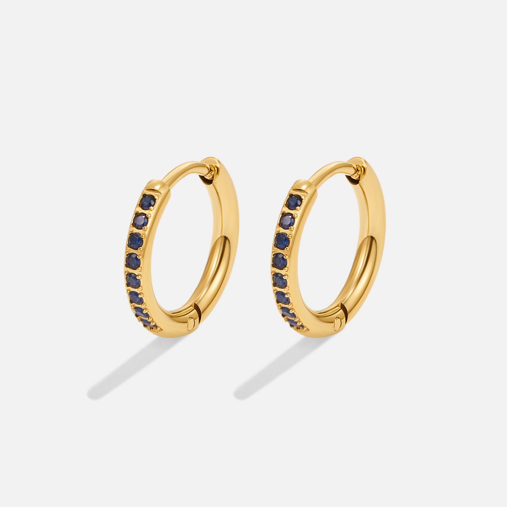 Blue Eternity Hoop Earrings, pair of gold hoop earrings with a row of dark blue stones