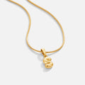 Bubble Letter Necklace, gold chain necklace with a puffy letter S pendant on white