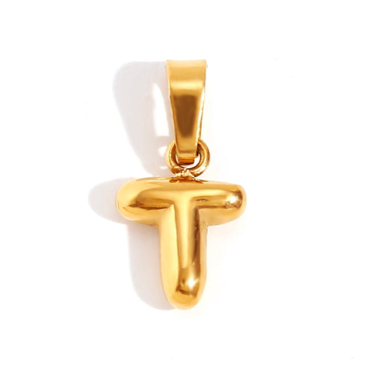 Bubble Letter Necklace, puffy gold letter T pendant on a plain white background