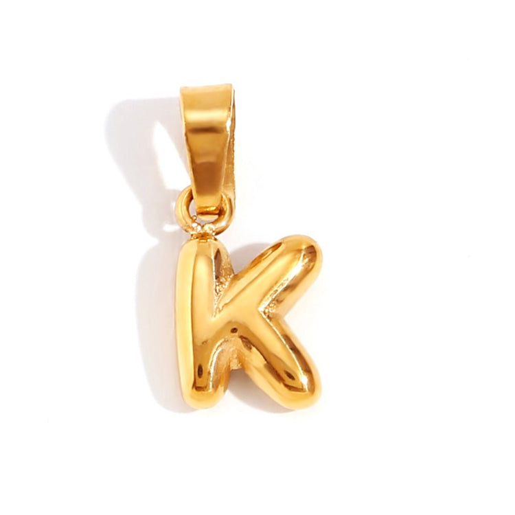 Bubble Letter Necklace, gold bubble-letter K pendant on a white background