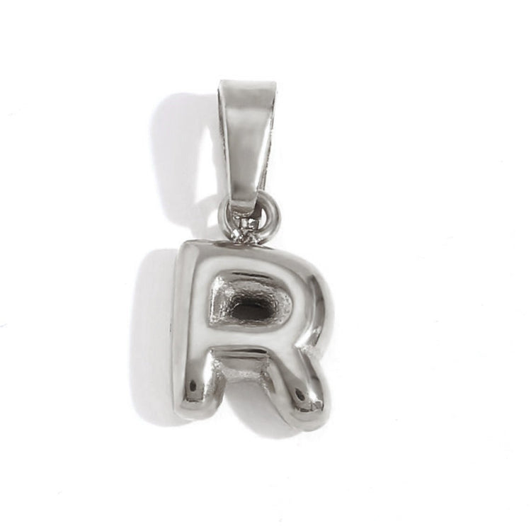 Bubble Letter Necklace, silver bubble-letter R pendant with a bail, on a white background