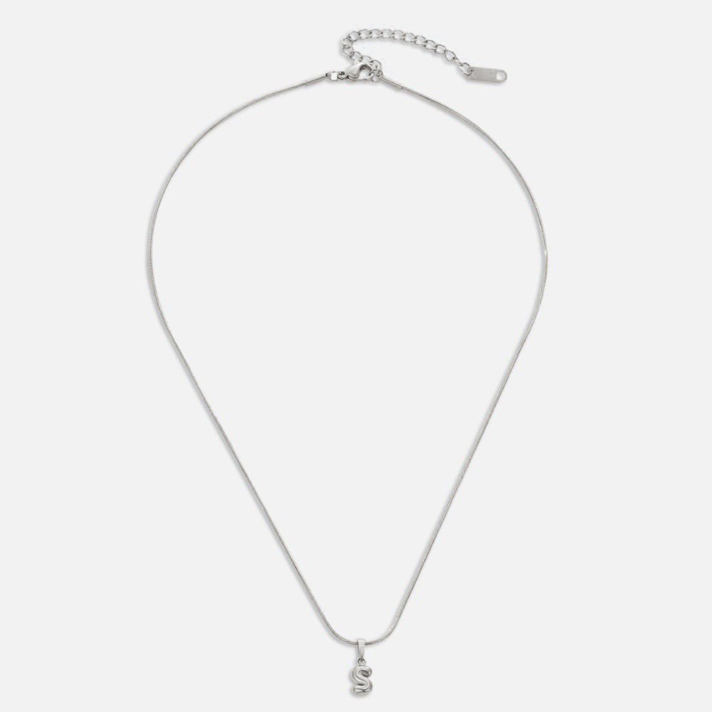 Bubble Letter Necklace, laid flat on white, silver chain with bubble letter S pendant