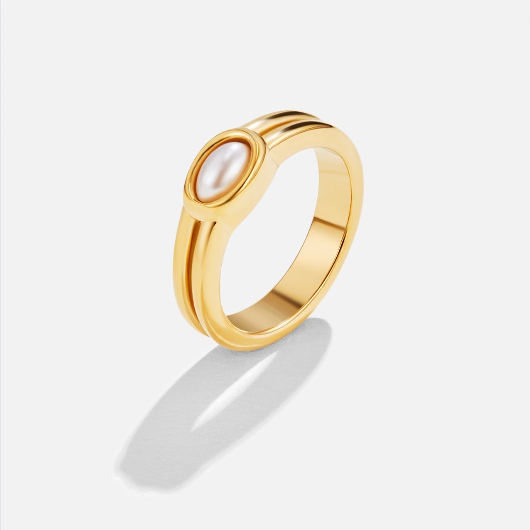 Chunky Pearl 18K Gold Ring, standing ring on white background, oval pearl set in gold
