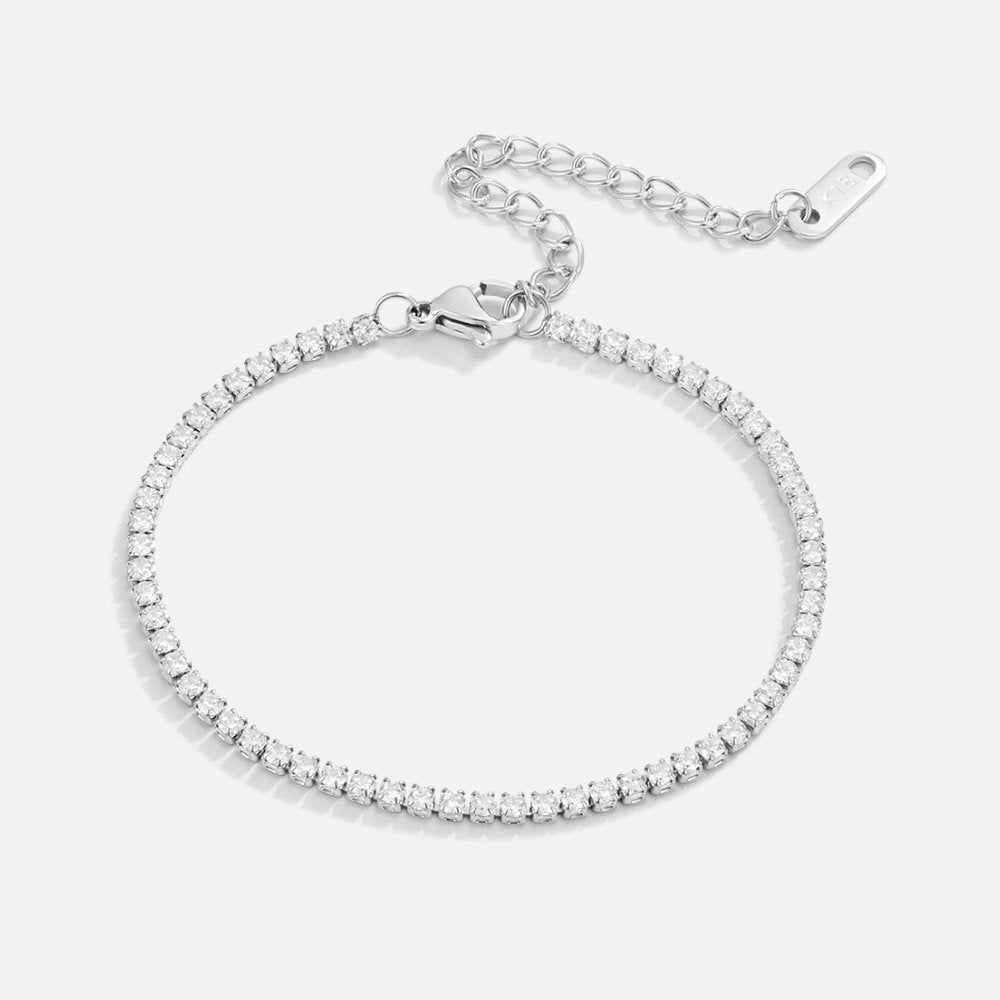 Cordelia Silver Tennis Bracelet, laid flat on a light grey background, clasp and extender