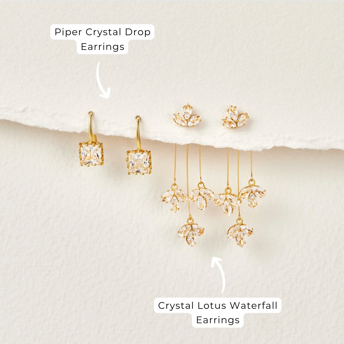 Crystal Lotus Waterfall Earrings, flat lay of gold earrings with clear crystal clusters on