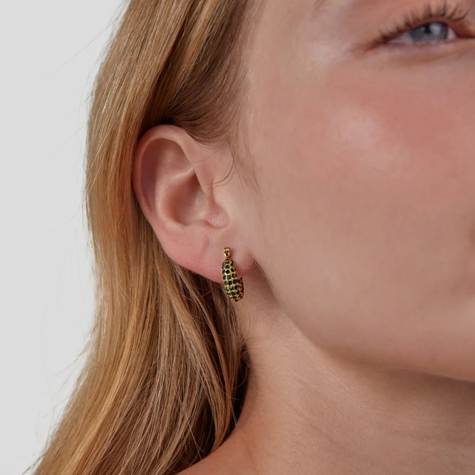 Emerald Beauty Hoop Earrings, worn on an ear, small gold hoop with green pavé stones