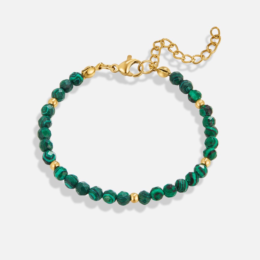 Emerald Green Beaded Bracelet, laid flat on a plain light background, showing the full