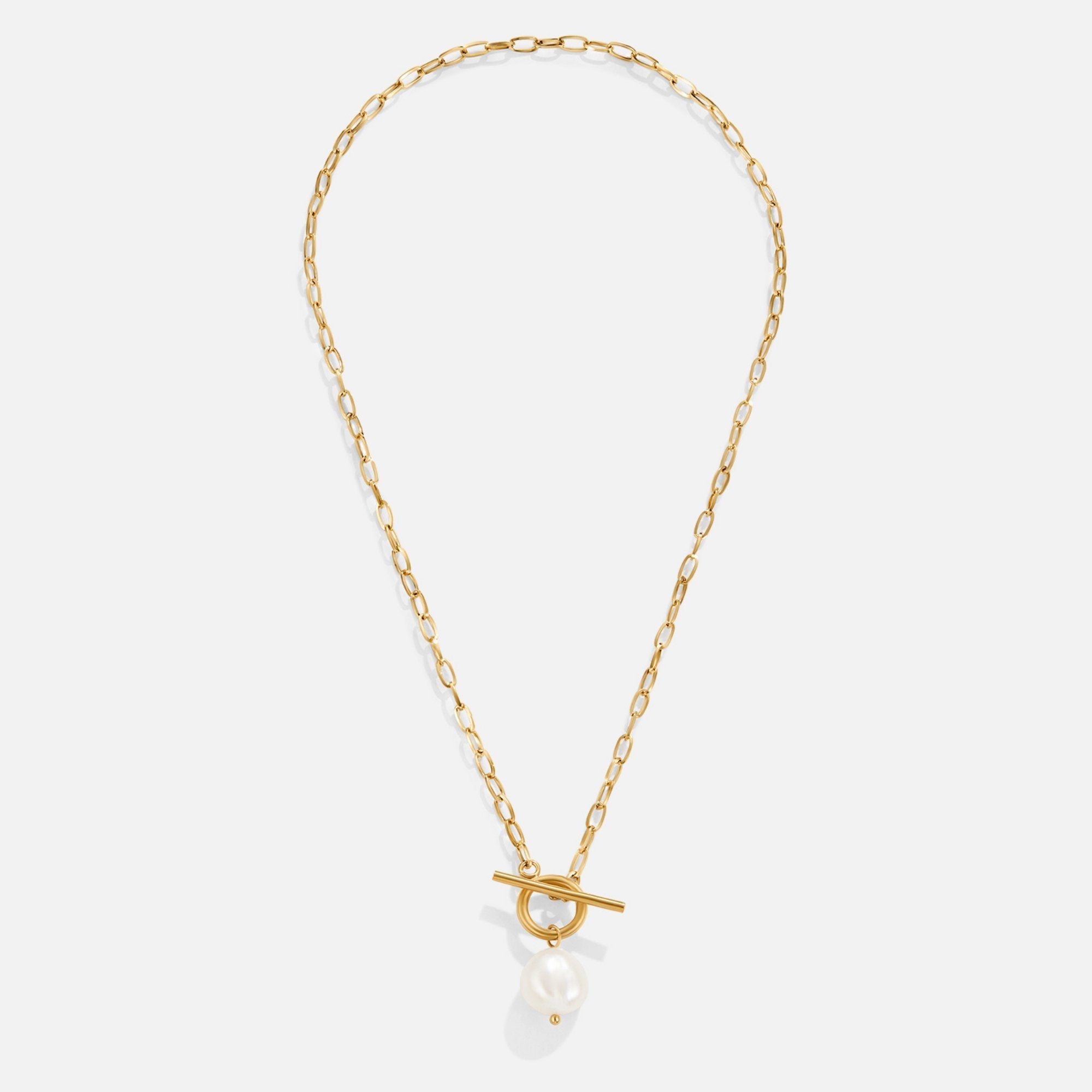 Eva Freshwater Pearl Gold Necklace, flat lay of gold chain necklace with toggle clasp and pearl drop