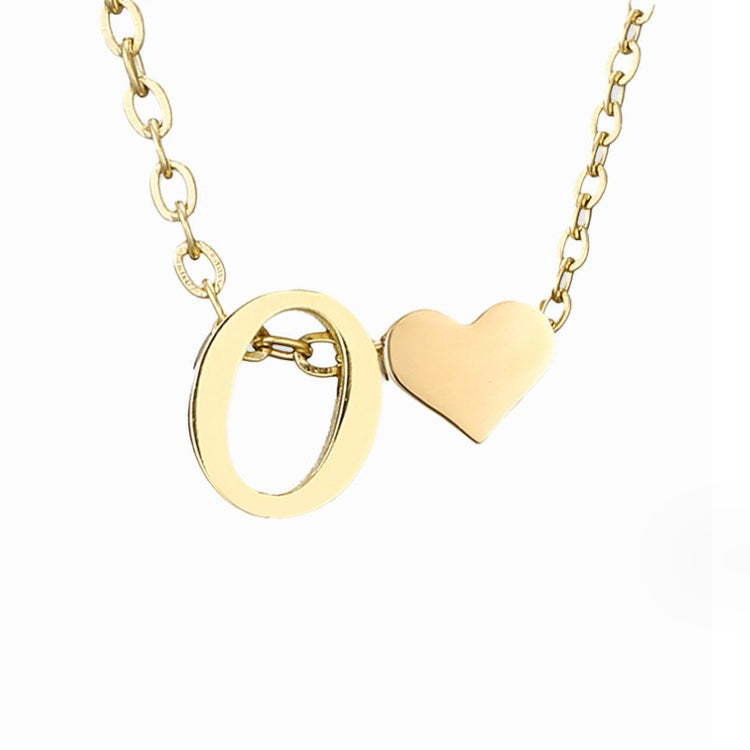 Forever Love & Letter Gold Necklace, close-up of gold letter O and heart pendant on chain